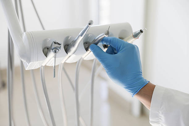 Professional Emergency Dentist technician working in Edmond, OK